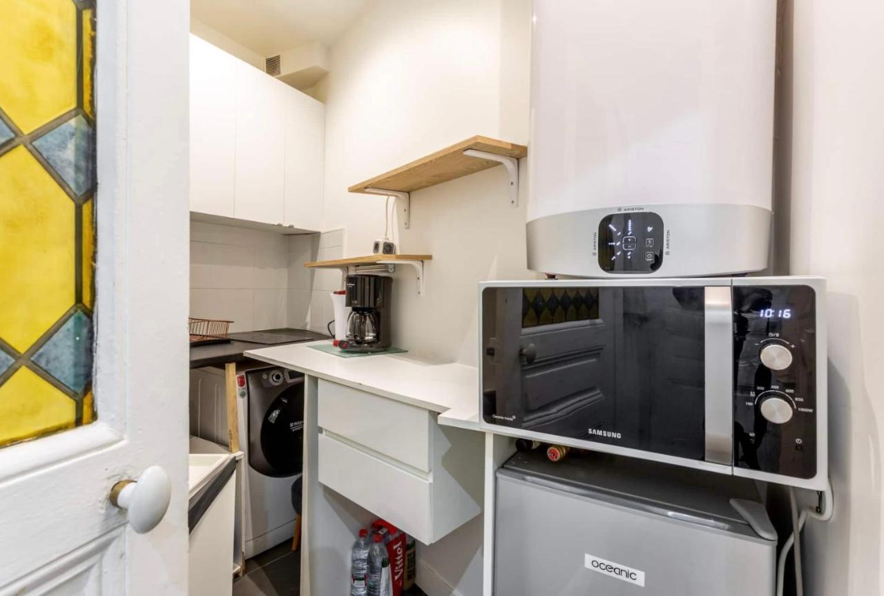 Abbesses - Superbe Appartement Avec Cheminees ปารีส ภายนอก รูปภาพ